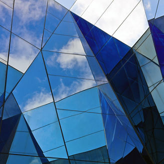 Modern building with sky reflection