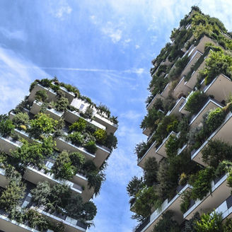 people working looking at papers