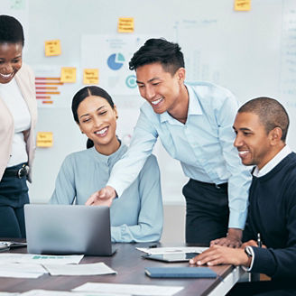 Business meeting, planning and teamwork while sharing idea on laptop for innovation by marketing team discussing research and crm. Diverse colleagues talking vision and mission for growth development.