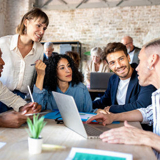 Young creative designer people working together and planning strategy, happy and successful teamwork