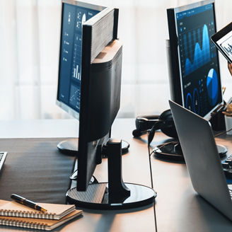 Analyst working on data analysis or BI dashboard on computer monitor. Business team analyzing financial data by Fintech in corporate office for business marketing and strategy planning. Trailblazing