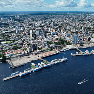 Downtown Manaus Brazil. Capital city of Amazonas State near Amazon river and Amazon forest. Tropical destination. Tropical travel. Tourism landmark.  Outdoors urban scenery downtown Manaus Brazil.