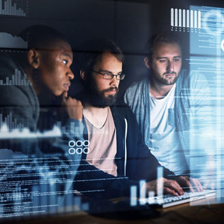 Programming hologram, man and team with computer at night for typing source code or graph data. Software development, group and web developer with cybersecurity analytics, database hacking and charts.