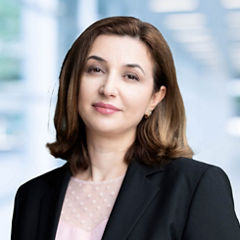 Blurred abstract background interior view looking out toward to empty office lobby and entrance doors and glass curtain wall with frame