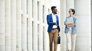 Two people talking during a walk