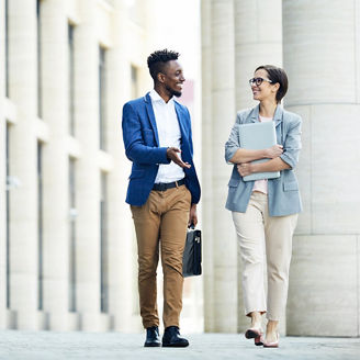 Two people talking during a walk