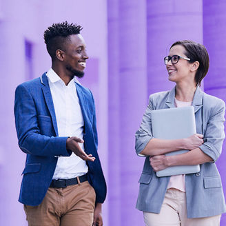 Two people talking during a walk