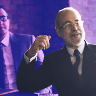 Businessmen at boardroom table