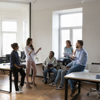 Three colleagues are discussing in the meeting room
