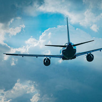 Airplane flying through clouds