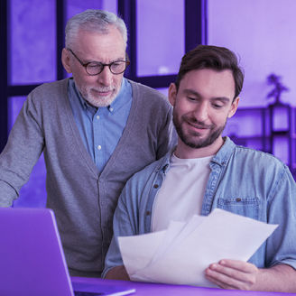 A father and son running their family business