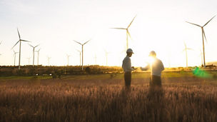 Workers at windmills