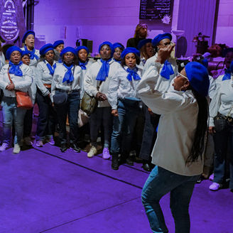 The women of choir Les Invisibles singing together for their rights