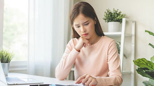 Asian woman deduction planning