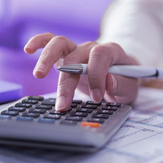 Person with money and calculator