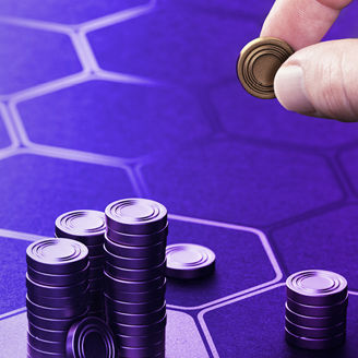 Stacks of coins on a dark background.