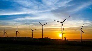 The view of windmills at sunset