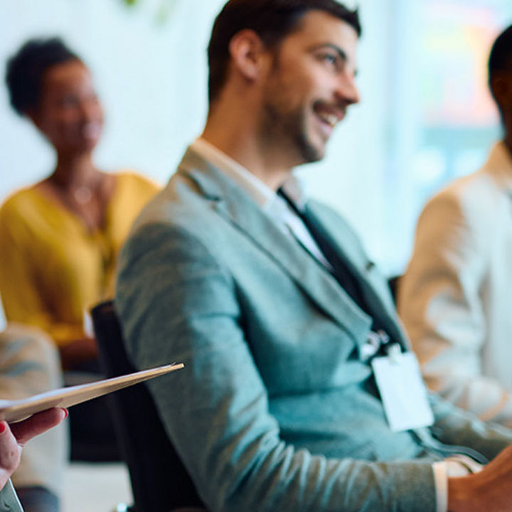 Man talking in auditorium