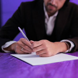 Man signing a document