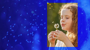 little girl with dandelion