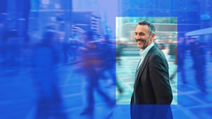 man-smiling-walking