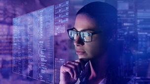 a women looking into a screen