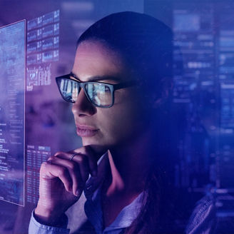 people working looking at papers