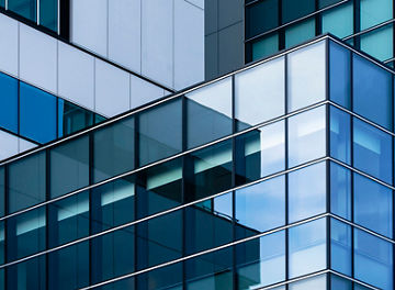 Architecture details Glass wall Modern building exterior Abstract futuristic background