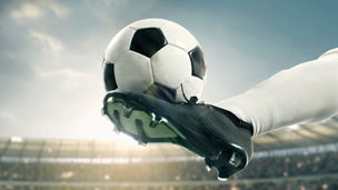 Banner. Soccer athlete performing high kick, striking soccer ball mid-air with precision, powerful motion captured against stadium backdrop. Concept of sport championship, match, tournament. Ad