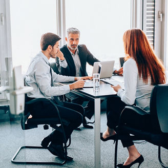 Colleagues discussing an idea at work.