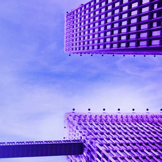 Looking up at 4 skyscrapers