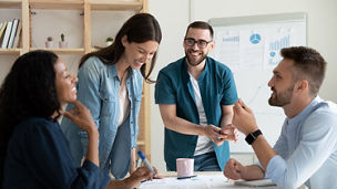 Team working and laughing together