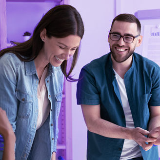 people are working and laughing