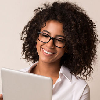 Happy-businesswoman-using-tablet-over-light-background - 1