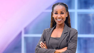 A smiling, experienced professional