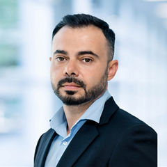 Blurred abstract background interior view looking out toward to empty office lobby and entrance doors and glass curtain wall with frame