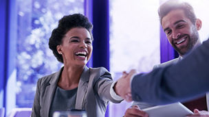 people are shaking hands