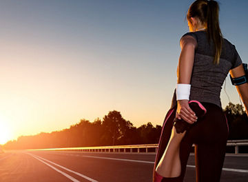 Woman stretching before running