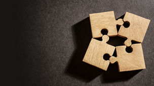 puzzle pieces against dark background