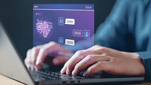 man typing on keyboard with digital ai screen