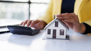 person writing on a paper