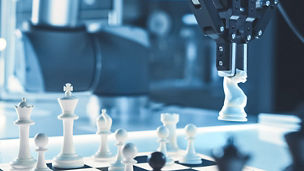 Man sitting in waiting room with robot