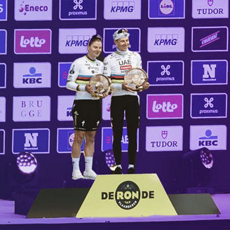 Female and male winner of the Tour of Flanders standing together on the podium