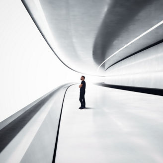 Man in a futuristic tunnel with lights