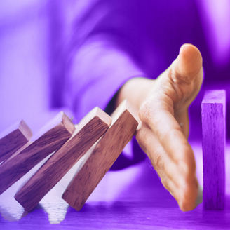 hand-blocking-falling-wood-pallet