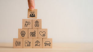 person writing on a paper