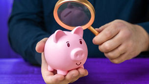 person writing on a paper