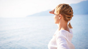 Woman looking at sunset