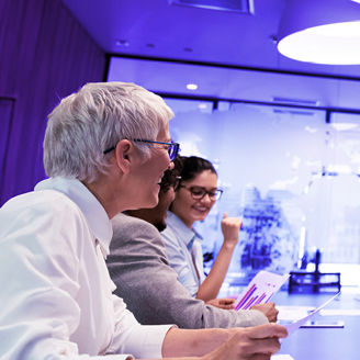 Group of people sitting in a meeting room