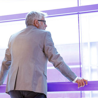a man looking into the window